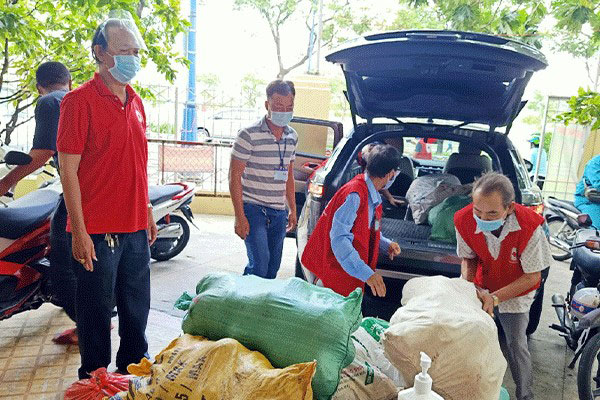 TP. Hồ Chí Minh: Tiếp nhận và phân phối nông sản hỗ trợ người dân vượt qua đại dịch - Ảnh 2.