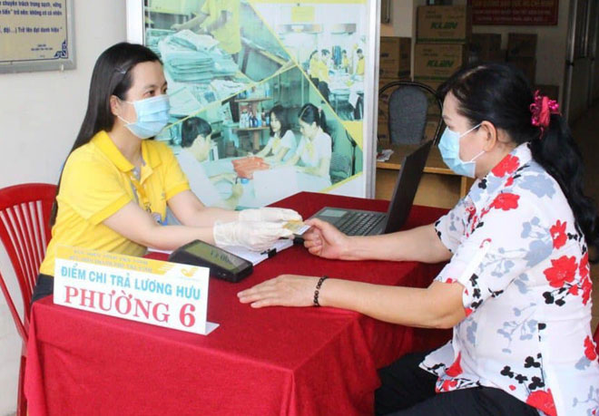 Trà Vinh nỗ lực phát triển đối tượng tham gia bảo hiểm xã hội - Ảnh 1.