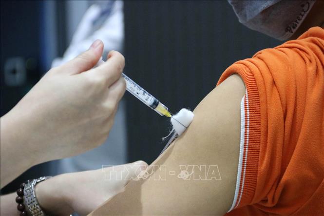 Hà Nội triển khai chiến dịch tiêm vaccine phòng COVID-19 diện rộng - Ảnh 1.